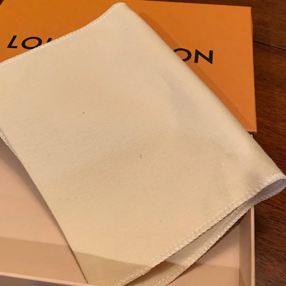 Authentic brand new Louis Vuitton Cream and Blue Dust Bag, small size, rare